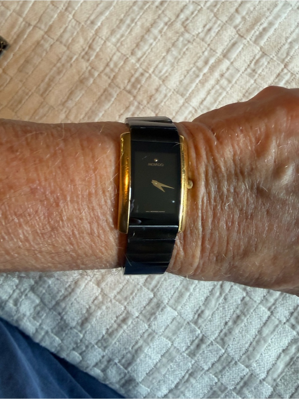 Movado Black Dial Watch with Gold-Tone Case and Black Bracelet